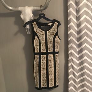 Perfect condition. Worn once. Open back. Black.